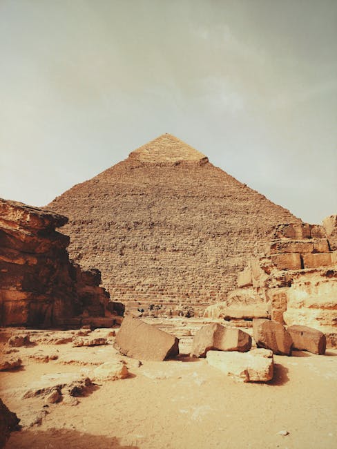 Stunning view of the iconic Great Pyramid of Giza in Egypt under a clear sky.